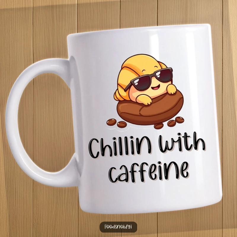 Funny Croissant Mug: A smiling croissant character in tiny sunglasses lounging on a coffee bean, a comical breakfast item.