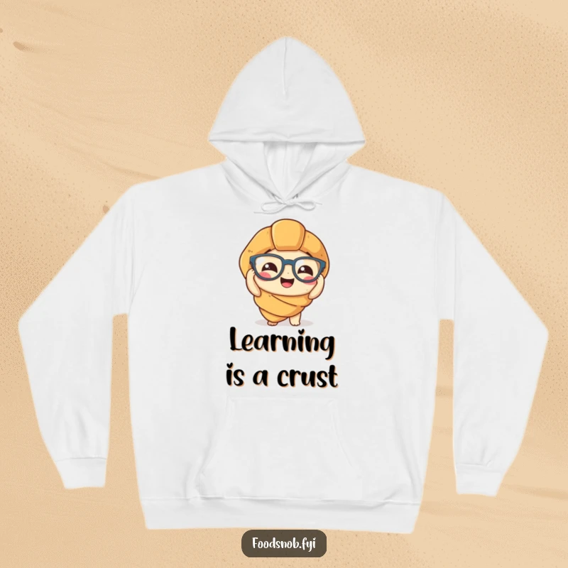 Funny Hoodie: A charming croissant character comically trying to put on small spectacles, radiating warmth and humor.