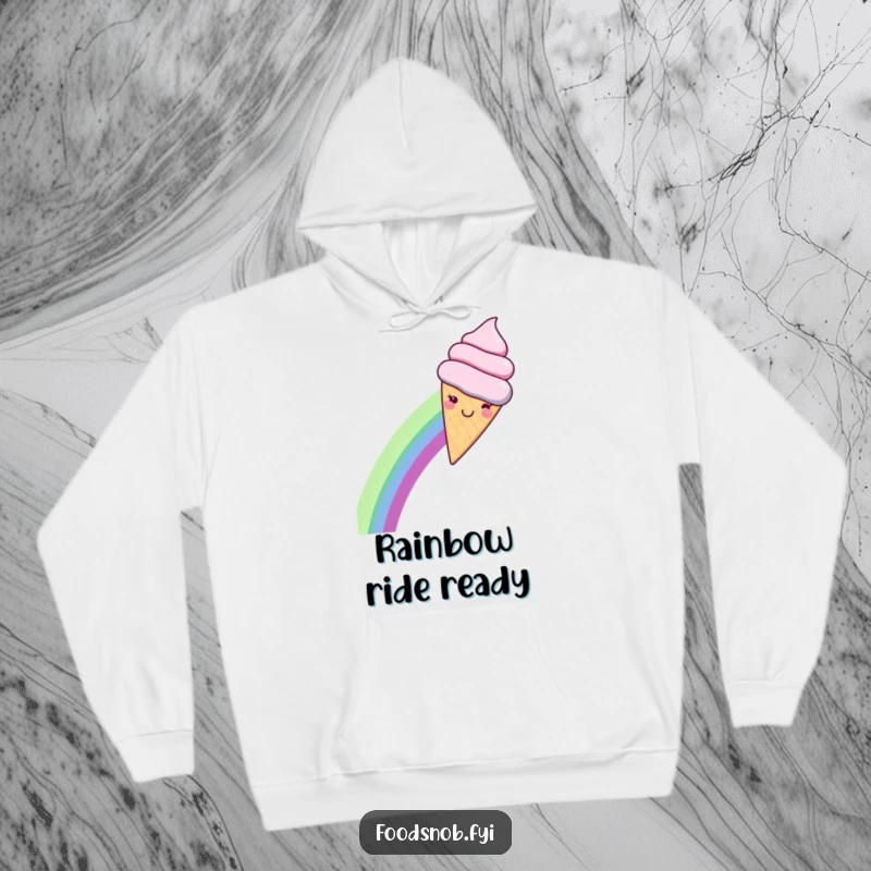 Funny hoodie with a smiling kawaii ice cream cone sliding down a bright rainbow, offering warmth and whimsical delight.