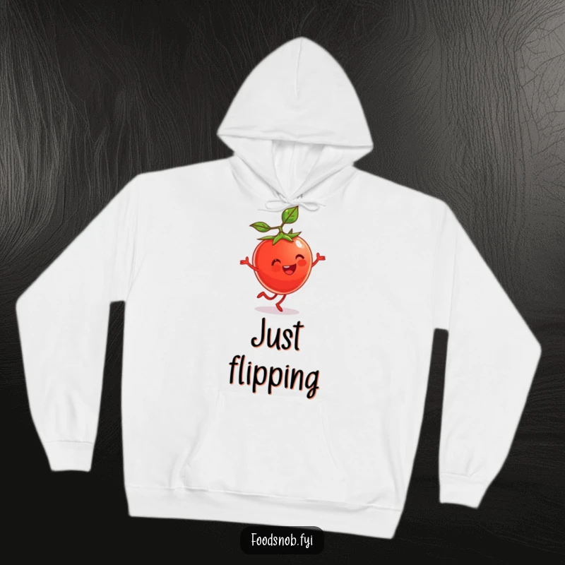 Funny Hoodie featuring a beaming cherry tomato character with tiny legs mid-cartwheel. Playful and warm.