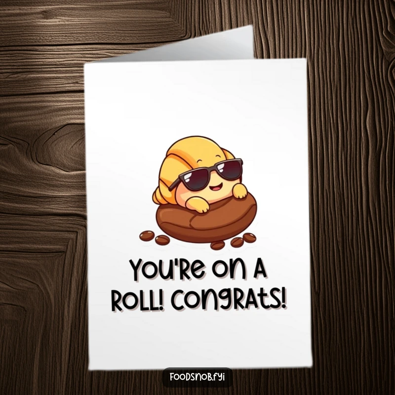 Free Printable Congratulations Card: A smiling croissant wearing sunglasses, lounging on a coffee bean, celebrating success coolly.