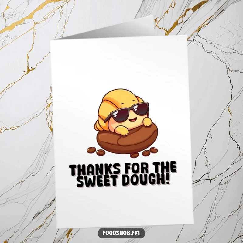 Free Printable Thank You Card: Croissant character in sunglasses lounging on a coffee bean, offering cool thanks.
